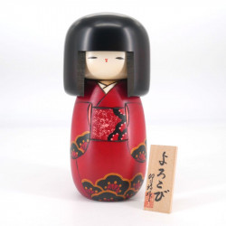 Japanese red kokeshi doll with joy pattern, YOROKOBI