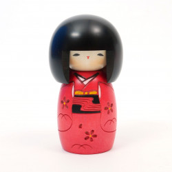 Japanese kokeshi doll with young girl motif in red, AKA OSANAGO
