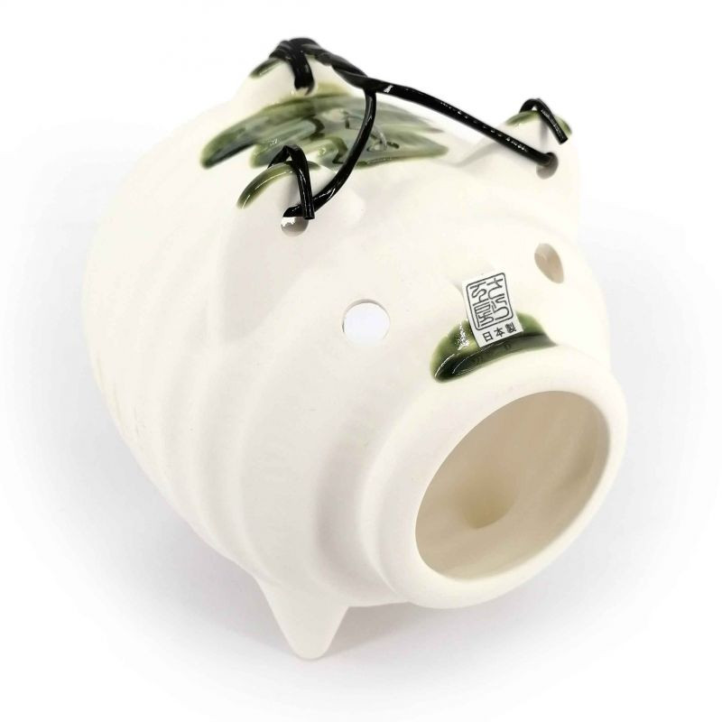 Japanese mosquito repellent holder in the shape of a white and green pig, KATORIBUTA