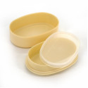 Beige oval Japanese bento lunch box with yellow flower pattern with a pair of matching chopsticks, KINMOKUSEI, 15.5cm